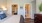 a bedroom with a large mirror